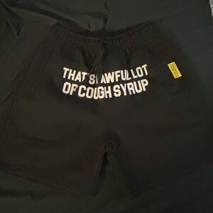 That's An Awful Lot Of Cough Syrup by Desto Dubb Black Sweat Shorts
Pockets